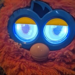Vibrant Orange and Blue Interactive Plush Toy